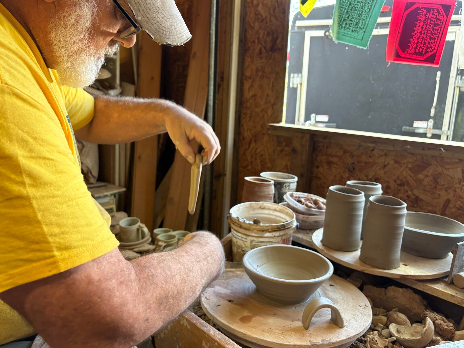 Barry Crowder at the throwing wheel he built.